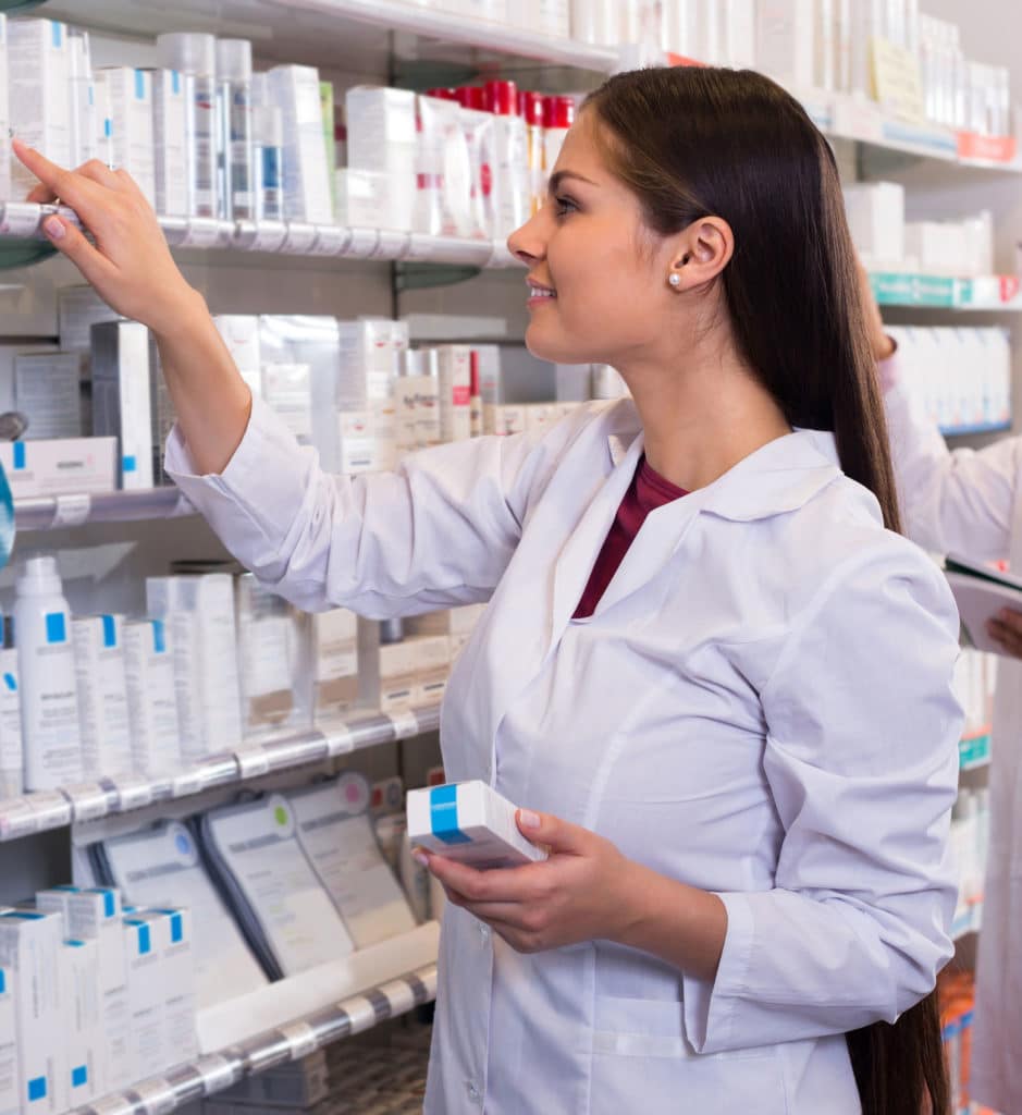 Pharmacists working in drugstore